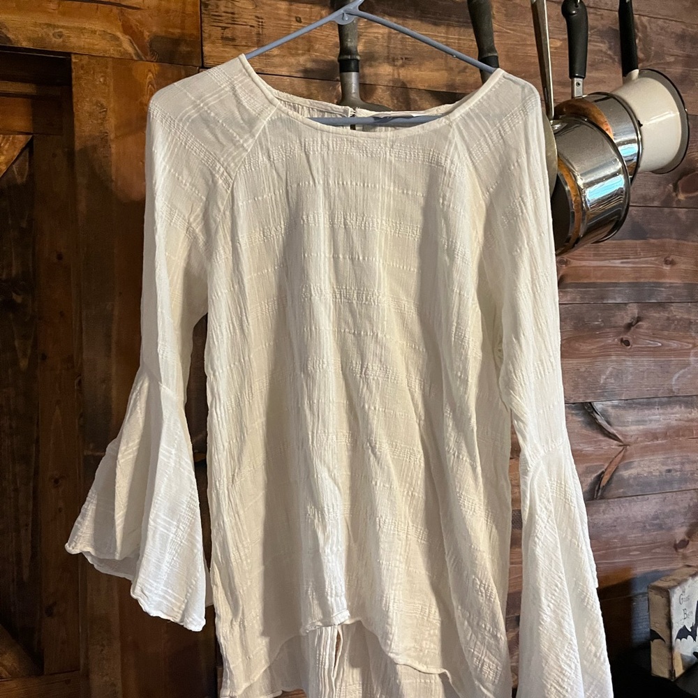 Dressy white blouse with slit in back